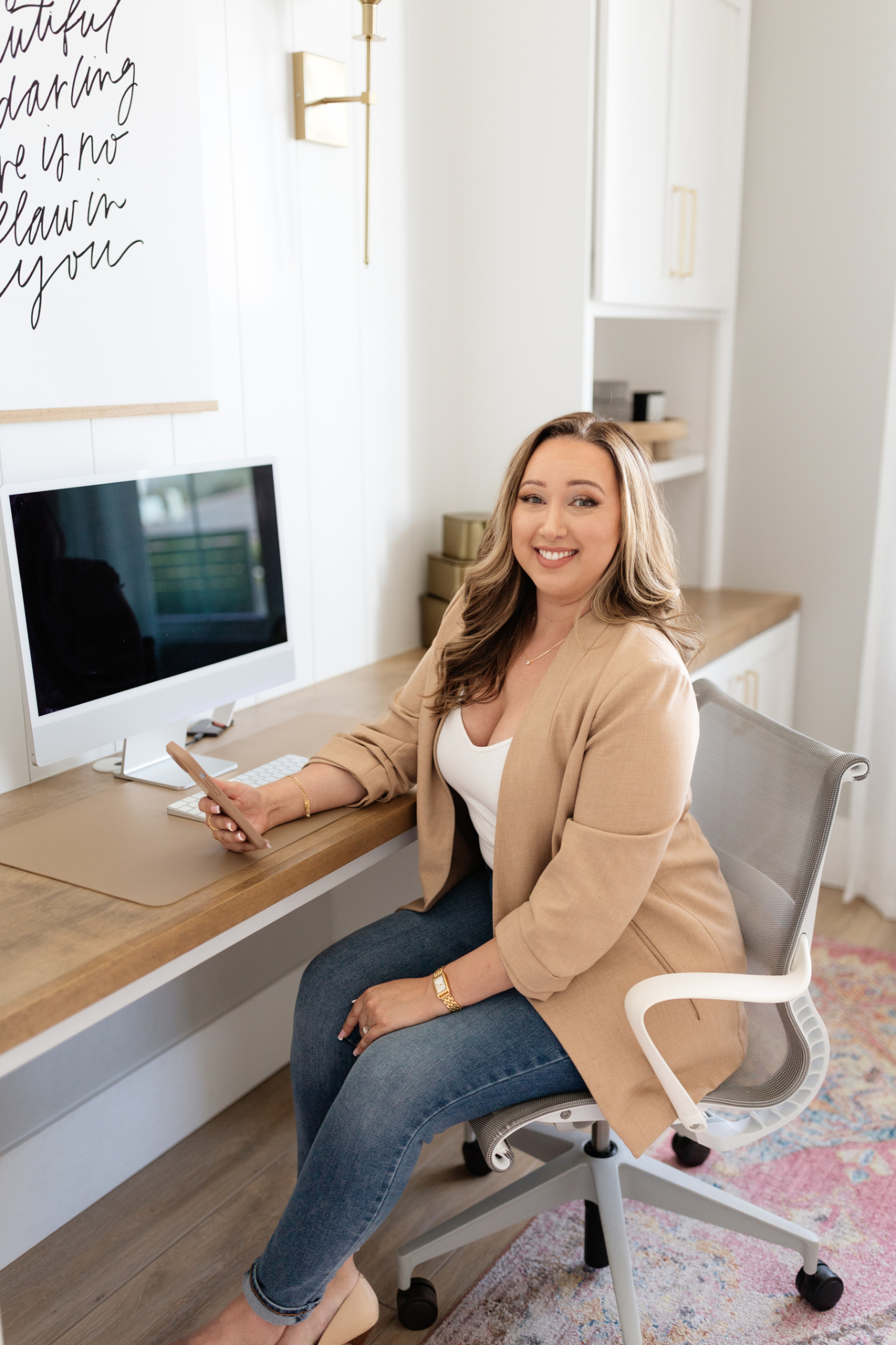 Haylee Duran at her desk